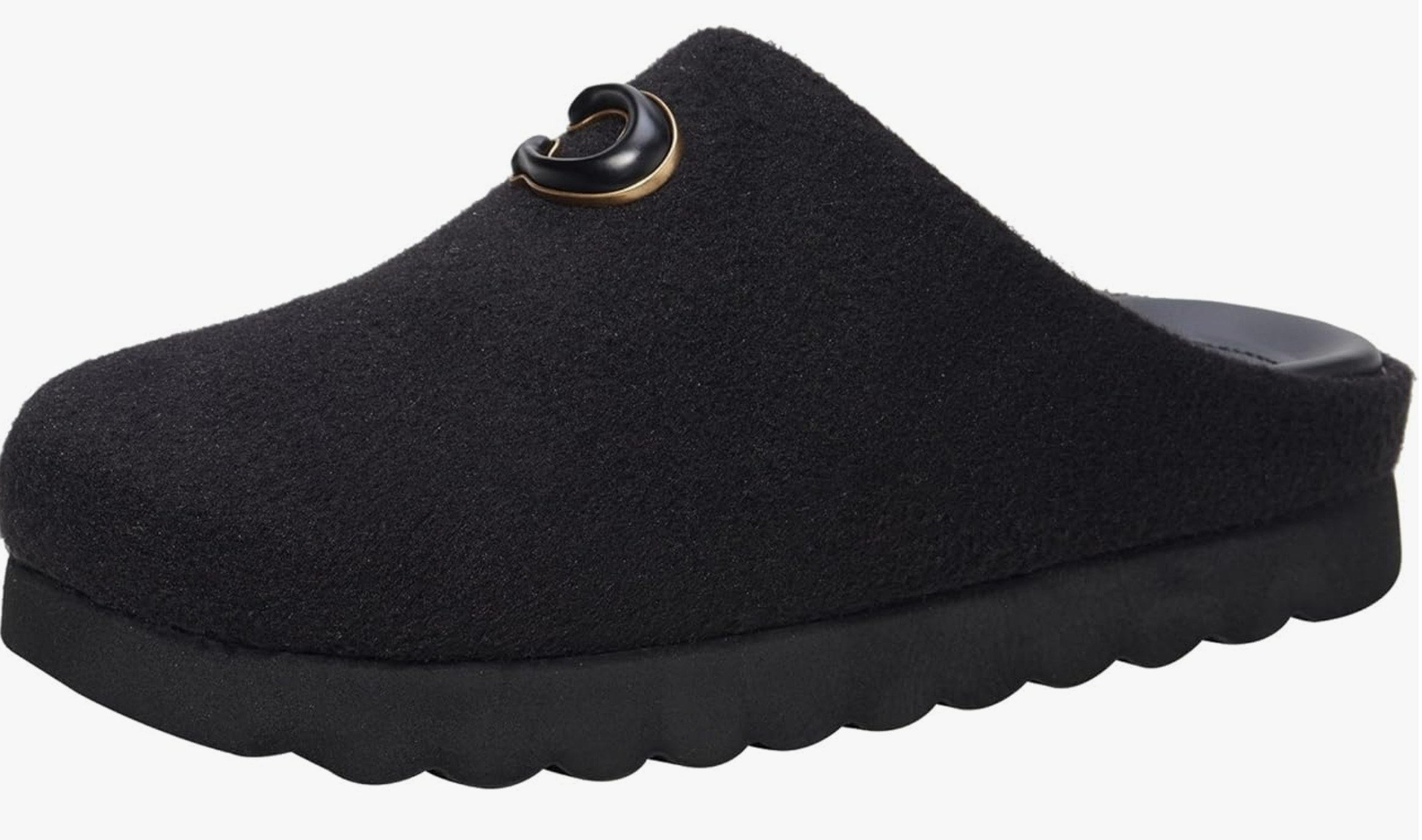 black slippers with a couch logo on the front